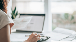 Woman calculating financials